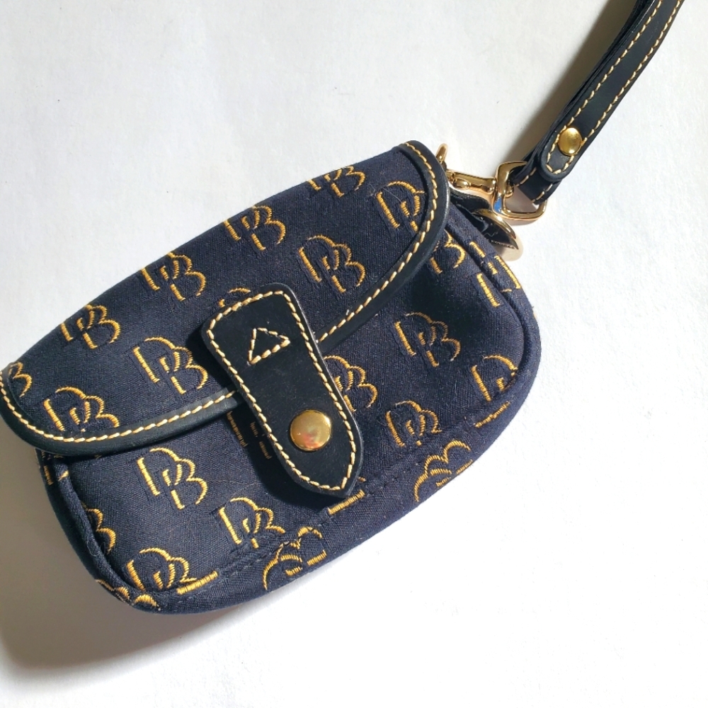 Dooney and Bourke Wristlet Black and Gold Canvas